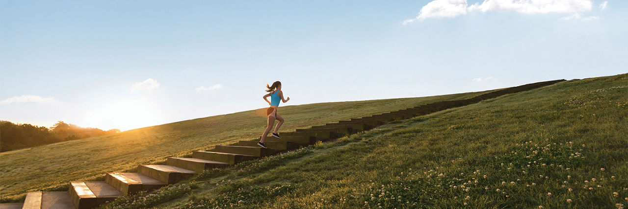 A girl running on the stairs