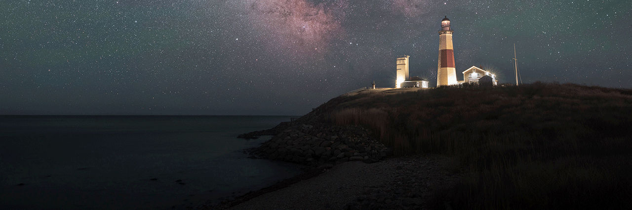 Lighthouse with stars at night